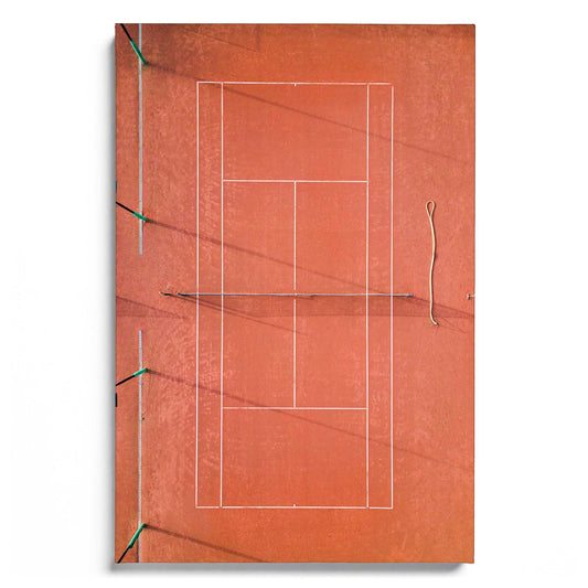 Red Tennis Court at Sunrise